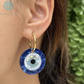 evil eye earrings gold hoop glossy finish lifestyle photo